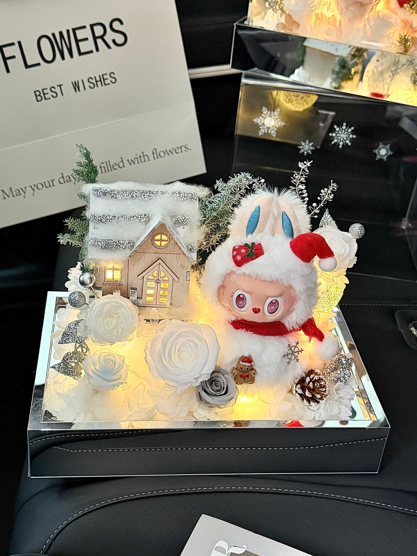 Handcrafted Christmas preserved flower box with LED snowy house & winter bunny. Perfect Xmas gift and festive home décor. Long-lasting preserved flowers.