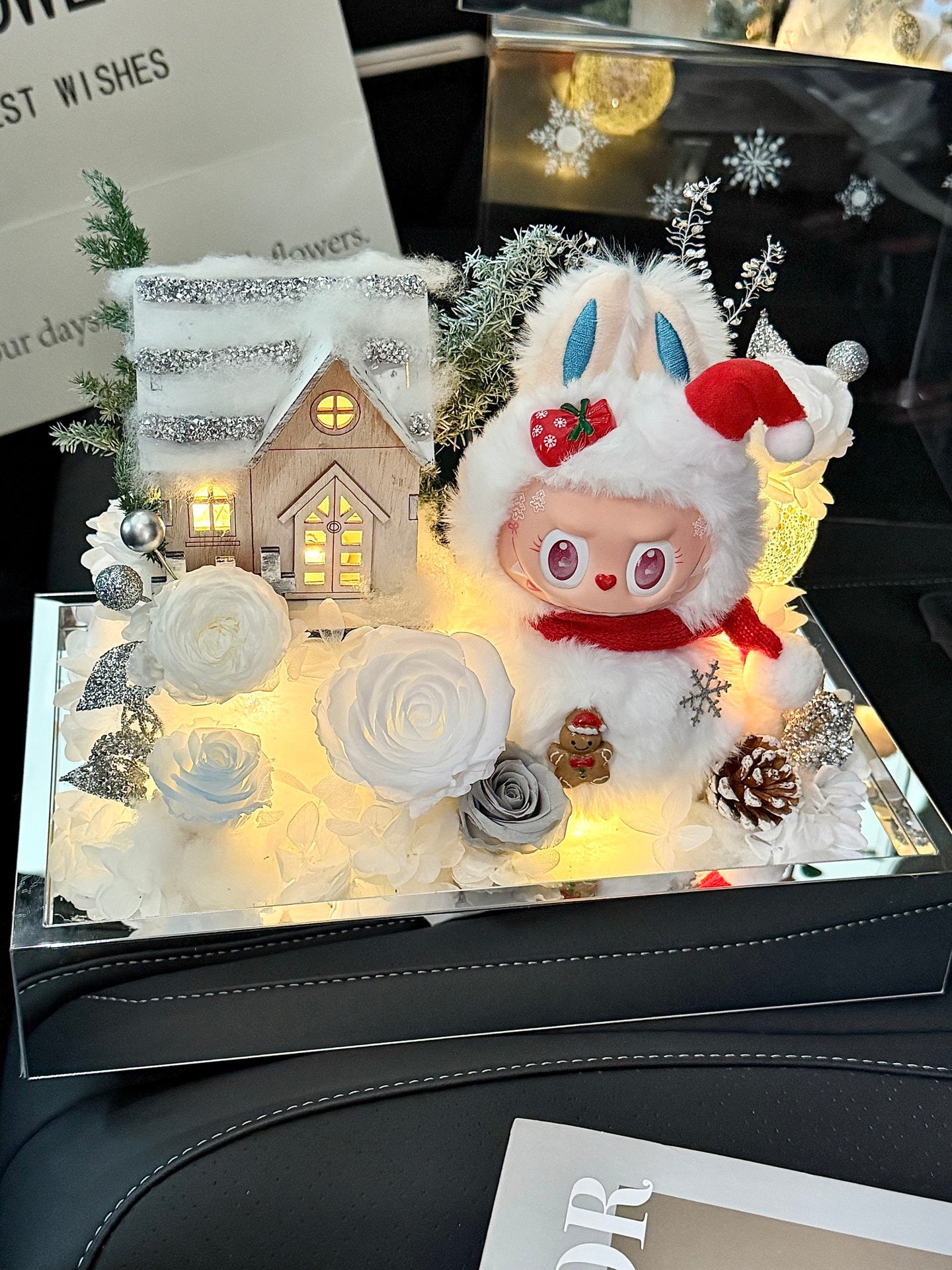 Handcrafted Christmas preserved flower box with LED snowy house & winter bunny. Perfect Xmas gift and festive home décor. Long-lasting preserved flowers.