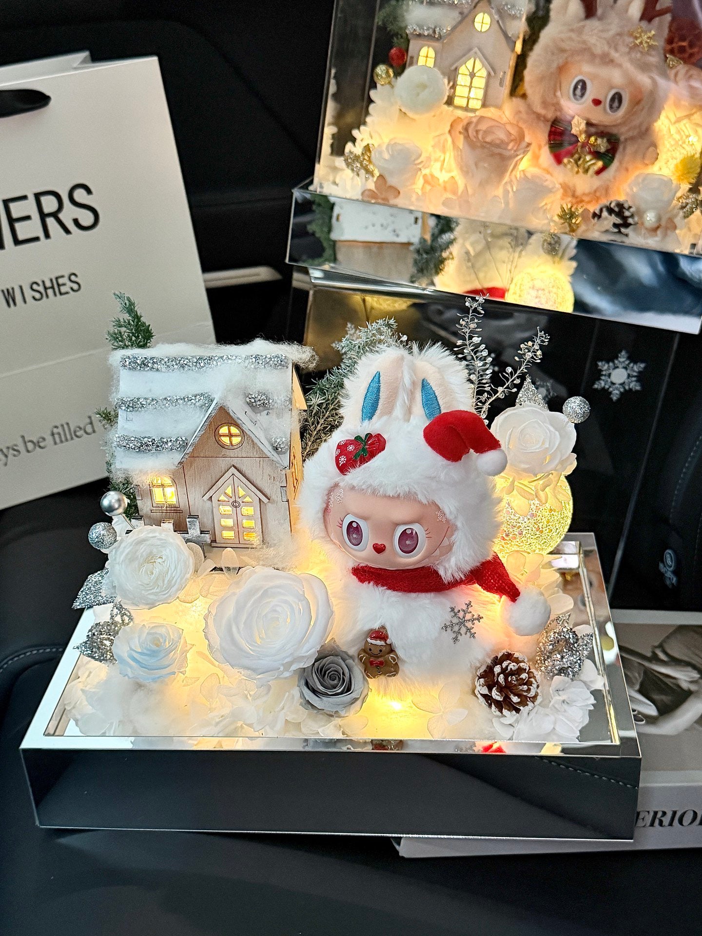 Handcrafted Christmas preserved flower box with LED snowy house & winter bunny. Perfect Xmas gift and festive home décor. Long-lasting preserved flowers.